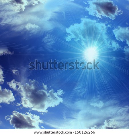 sky with sun rays dark blue background silhouette and dark clouds