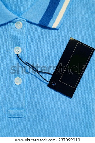 Light blue Polo T-shirt and blank label.