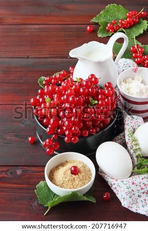 Ingredients for tasty homemade cake with red currant.Selective focus.