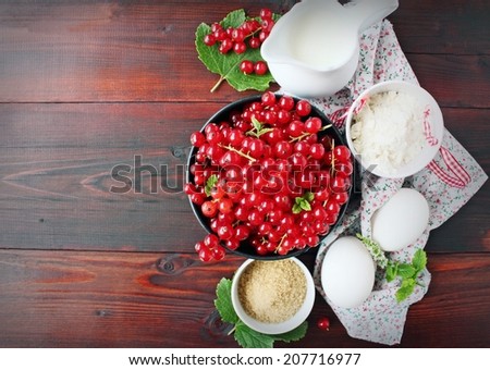Ingredients for tasty homemade cake with red currant. Copy space,selective focus.