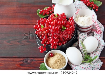 Ingredients for tasty homemade cake with red currant.Selective focus.