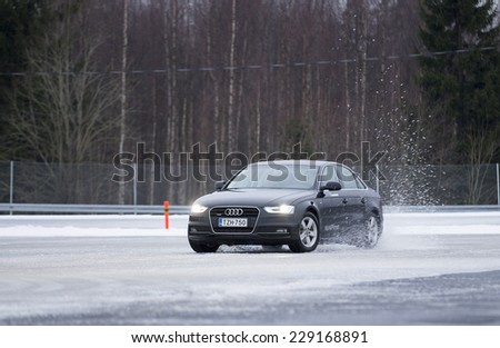 NOKIA, FINLAND - NOVEMBER 2, 2014: The Audi Quattro Tour 2014 test drive day in Nokia, Finland. Professional drivers were teaching how to drive safely in winter conditions on November 2, 2014.