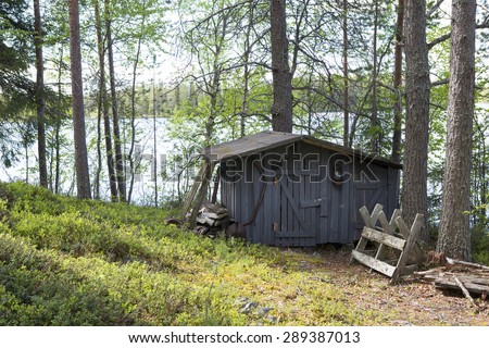An old shed for wood and tools in the countryside of Finland