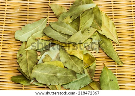 Dried bay leaves or laurel on a woven bamboo/ Bay Leaves