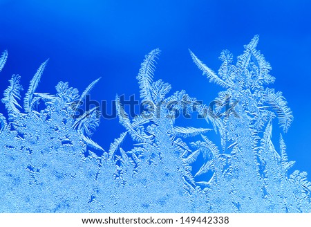 Rime on frosted window glass