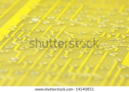 close-up of yellow computer circuit board
