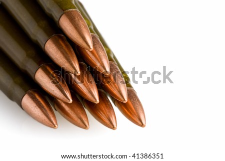 Bullets pile isolated on white with space for text