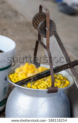 Boiling cocoon in a pot to prepare a silk. (manual prepare silk process)