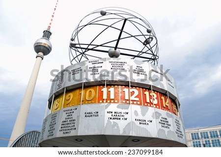 Berlin, Germany. May 14, 2013. The World Clock at Alexanderplatz. The structure was designed by Erich John. In the background, the television tower