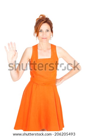 Beautiful businesswoman doing different expressions in different sets of clothes: waving