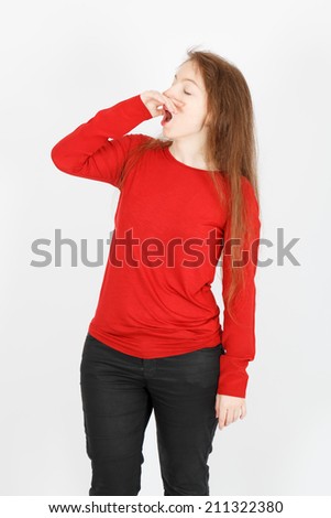 Beautiful businesswoman doing different expressions in different sets of clothes: yawning
