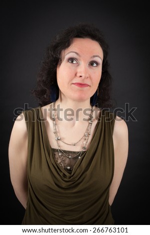 Beautiful woman doing different expressions in different sets of clothes: thinking
