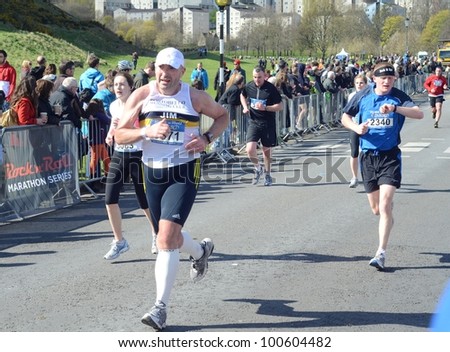 EDINBURGH - APRIL 15: runners participate in the inaugural Rock \'n\' Roll Half Marathon on April 15, 2012 in Edinburgh, Scotland.