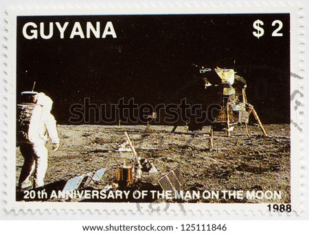 GUYANA - CIRCA 1988: a stamp from Guyana shows image of the first moon landing, circa 1988