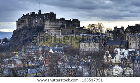 EDINBURGH - FEBRUARY 24: Castlehill on February 24, 2013 in Edinburgh, Scotland. Edinburgh Castle sits at the top of Castlehill and is one of Scotland\'s most visited tourist attractions.