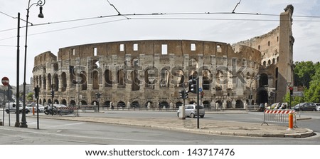 ROME - JUNE 5: the Colosseum on June 5, 2013 in Rome, Italy. The Colosseum is the largest amphitheatre in the world and a major tourist attraction.