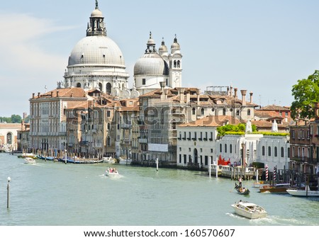 VENICE, ITALY - JUNE 6: view of St Maria of Salute Basilica from Accademia bridge on June 6, 2013 in Venice, Italy. Venice is one of the world\'s most popular tourist destinations with 21m visitors pa.