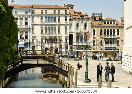VENICE, ITALY - JUNE 6: tourists on Fondamenta Bragadin on June 6, 2013 in Venice, Italy. Venice is one of the world\'s most popular tourist destinations with 21 million visitors per annum.