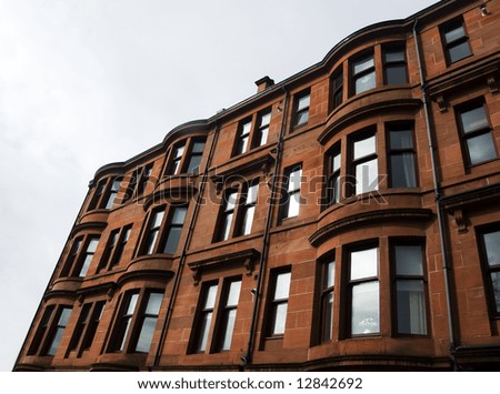 Tenement Facade - residential middle class property exterior with bay windows in Glasgow, Scotland, UK