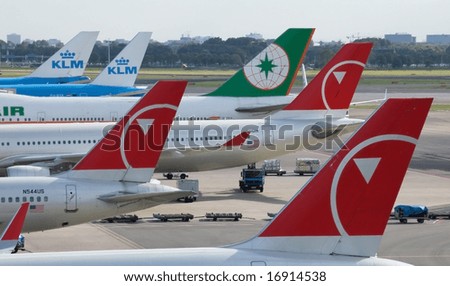 AMSTERDAM - JULY 16: Six airplanes sit parked at Amsterdam's Schiphol airport as airlines struggle financially following record oil prices July 16, 2008 in Amsterdam.