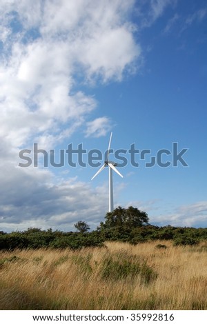 Wind turbine in rural location in the north of Scotland near Findhorn, producing electricity for sustainable communities of the future