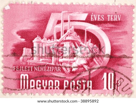 HUNGARY - CIRCA 1950: A stamp printed in Hungary shows image celebrating the five year plan for heavy industry, series, circa 1950