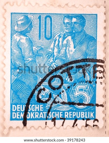 EAST GERMANY - CIRCA 1956: A stamp printed in East Germany shows image of agricultural workers, series, circa 1956