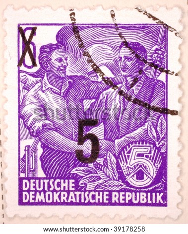 EAST GERMANY - CIRCA 1951: A stamp printed in East Germany shows image of two men, series, circa 1951