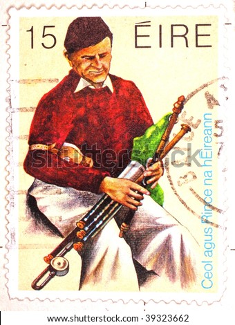 IRELAND - CIRCA 1945: A stamp printed in Ireland shows image celebrating music and dance of Ireland (Ceol agus rince na hEireann), series, circa 1945