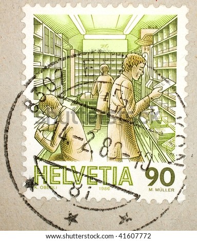 SWITZERLAND - CIRCA 1986: A stamp printed in Switzerland shows image of a postal sorting office, series, circa 1986