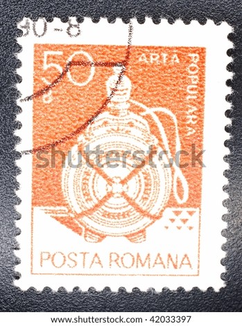 ROMANIA - CIRCA 1990: A stamp printed in Romania shows image celebrating popular art, series, circa 1990