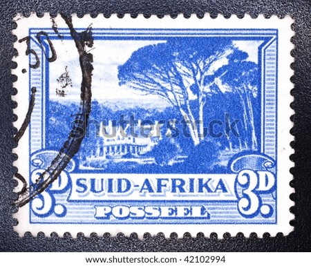 SOUTH AFRICA - CIRCA 1949: A stamp printed in South Africa shows image of a home in a beautiful rural location, series, circa 1949