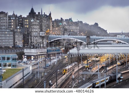 Central Edinburgh, Scotland - landscape view of Waverley Station, North Bridge and Edinburgh Castle