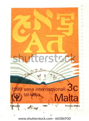 MALTA - CIRCA 1990: A stamp printed in Malta shows image of an open book, circa 1990
