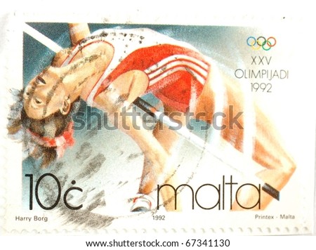 MALTA - CIRCA 1992: a stamp of Malta shows image of an Olympic athlete doing the high jump, circa 1992