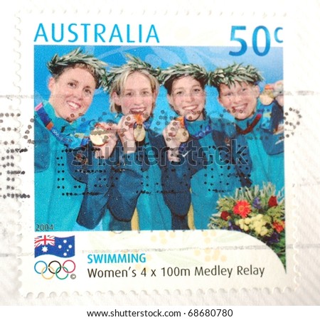 AUSTRALIA - CIRCA 2004: a stamp from Australia shows image of the gold medal winning women\'s 4x100m medley relay team from the Athens Olympics, circa 2004