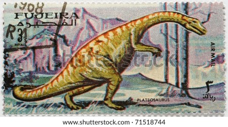 FUJEIRA - CIRCA 1968: a stamp from Fujeira from the dinosaurs series shows image of a plateosaurus from the Late Triassic period, circa 1968
