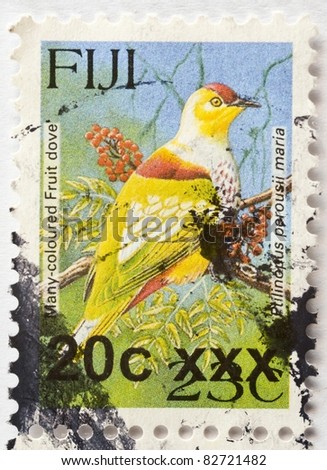 FIJI - CIRCA 2008: A stamp from Fiji shows image of a many-coloured fruit dove (Ptilinopus perousii), circa 2008
