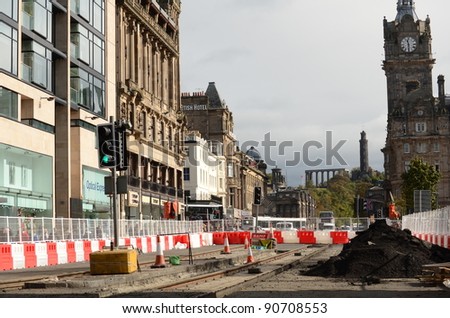 EDINBURGH - SEPTEMBER 23: Princes Street is closed  to allow tram construction works to take place on September 23, 2011 in Edinburgh, UK. The Tram Project is significantly delayed and over-budget.