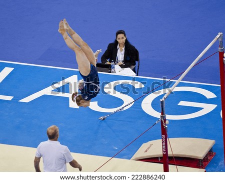 GLASGOW, UNITED KINGDOM - JULY 30: unidentified Scottish gymnast on Uneven Bars in Ladies All Around B Final at Commonwealth Games in SSE Hydro on July 30, 2014 in Glasgow, United Kingdom.
