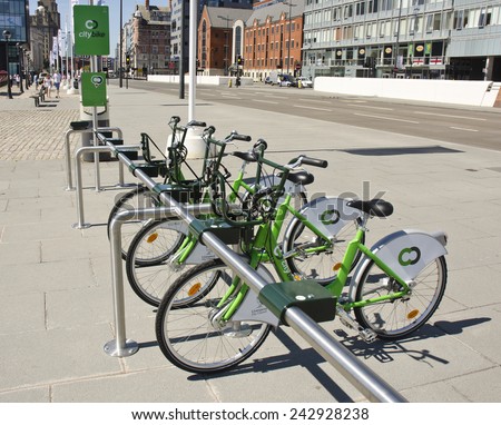 LIVERPOOL, UNITED KINGDOM - JUNE 23: bicycles of the City Bike public cycle hire scheme on June 23, 2014 in Liverpool, United Kingdom. Liverpool\'s City Bike scheme launched in May 2014.