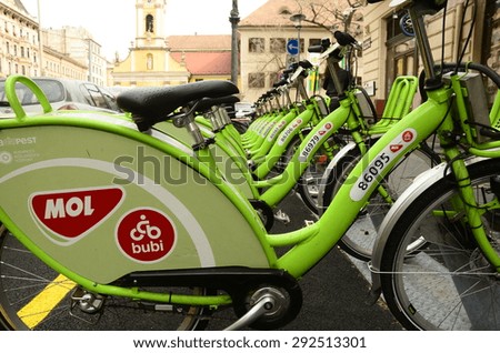 BUDAPEST, HUNGARY - MARCH 27: MOL BuBi public bicycle system bicycles docked for hire on March 27, 2015 in Budapest, Hungary. The Budapest BuBi scheme includes 1,100 bicycles for public hire.