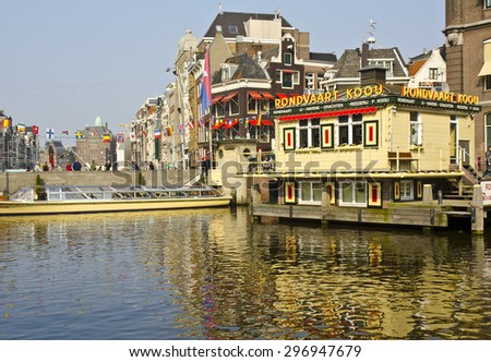 AMSTERDAM, NETHERLANDS - MARCH 18: a boat trip centre on March 18, 2015 in Amsterdam, Netherlands. Amsterdam is the capital and largest city of the Netherlands with a population of 780,000.