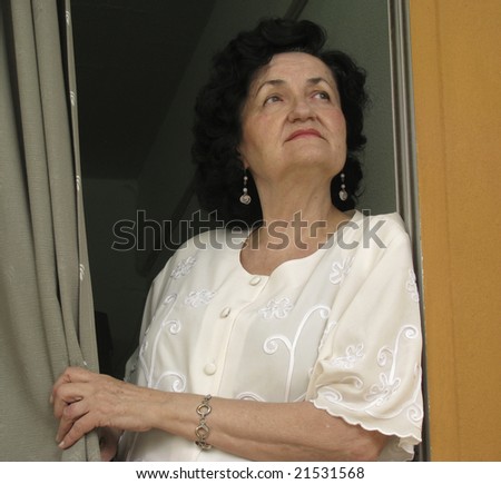 stock photo lonely mature lady waiting