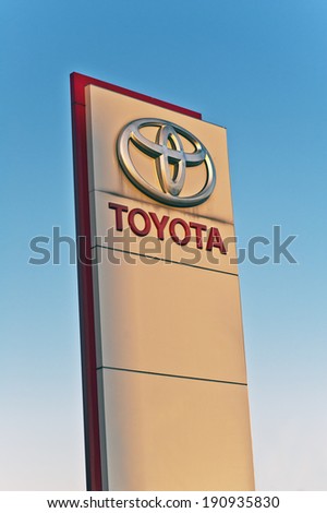 LITHUANIA - MAY 04:TOYOTA logo in the blue sky on May 04,2014 in Lithuania.Toyota Motor Corporation is a Japanese automaker headquartered in Toyota, Aichi, Japan.