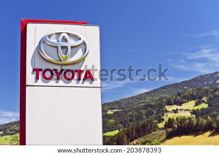 AUSTRIA - JULY 02:TOYOTA logo in the blue sky on July 02,2014 in Austria.Toyota Motor Corporation is a Japanese automaker headquartered in Toyota, Aichi, Japan.
