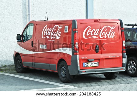 KRONBERG, GERMANY - JUNY 22: minibus Coca-Cola on streett on Juny 22,2014 in Kronberg, Germany.