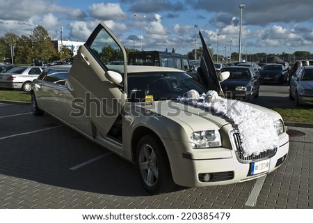 LITHUANIA-SEPTEMBER 25:Wedding limo rent on September 25,2014 in Lithuania.A limousine (or limo) is a luxury sedan or saloon car.