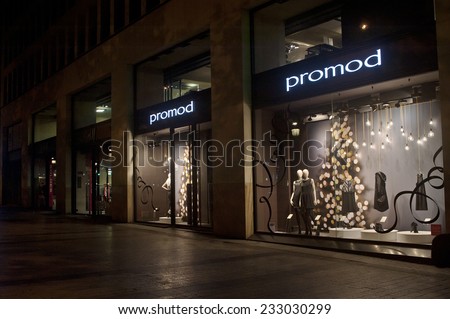 PARIS-NOV 23:PROMOD store at night on November 23,2014 in Paris.Promod is an originally French chain of women\'s fashion stores with more than 1,000 sale points and 5,000 employees in some 50 countries