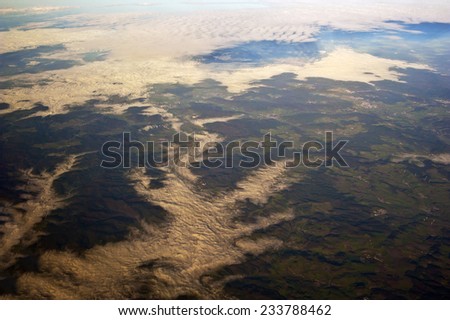 view of the earth in cloudy day and fog